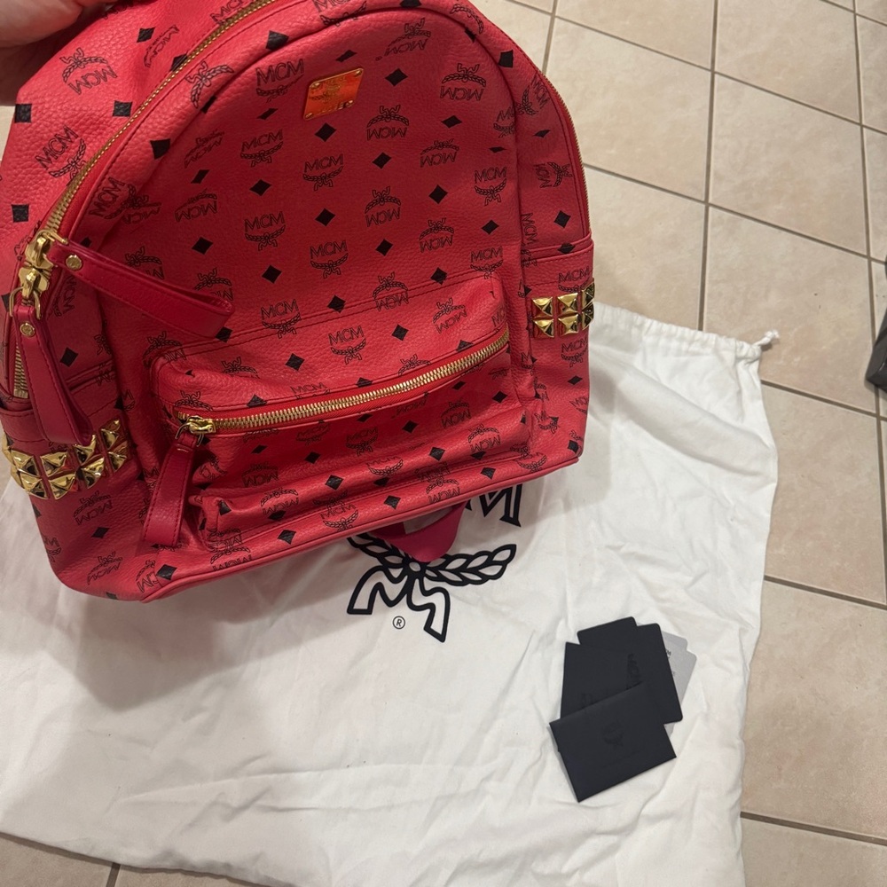 MCM Red Backpack with Gold Accents